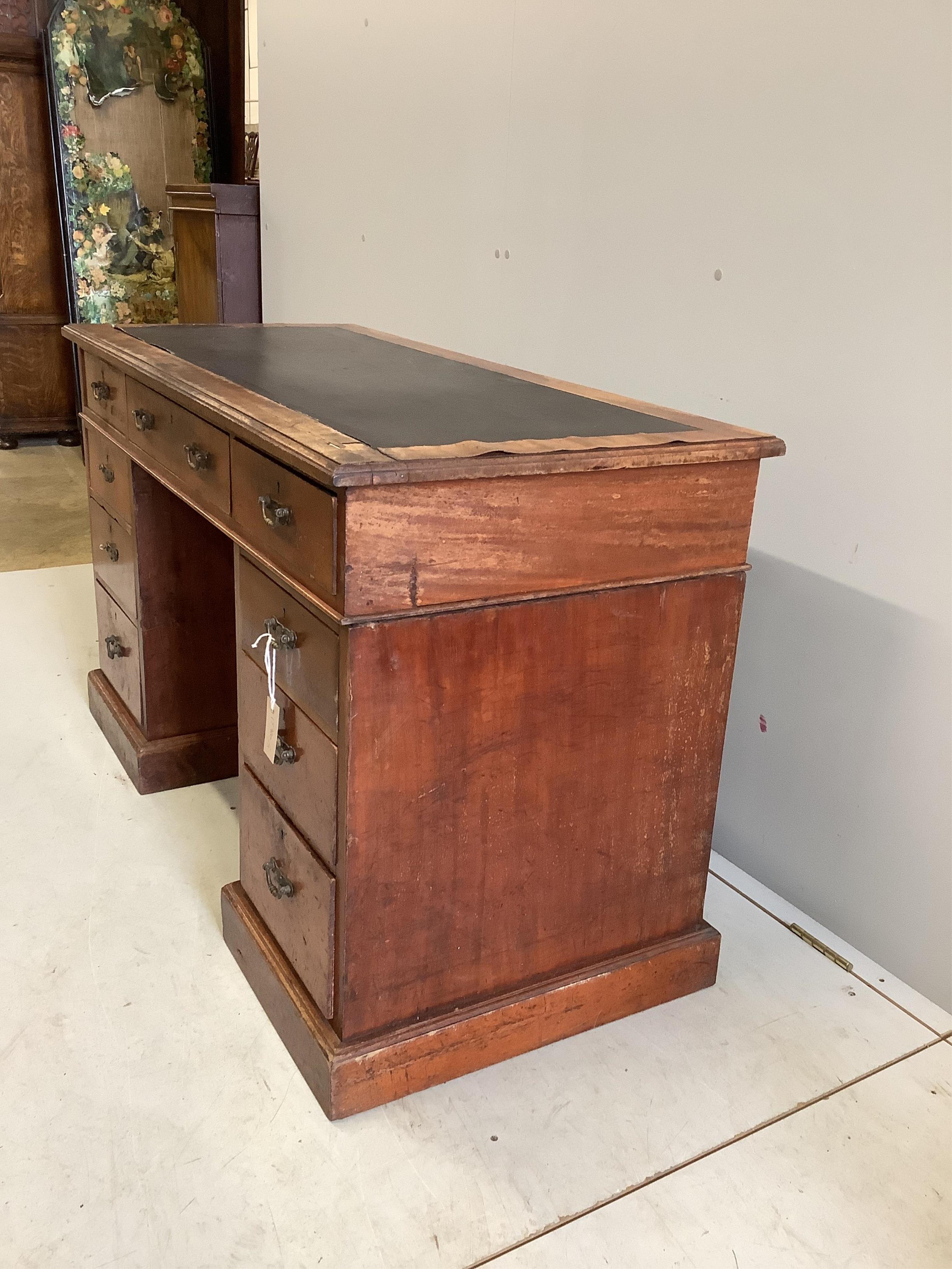 A Victorian mahogany pedestal desk, width 122cm, depth 55cm, height 75cm. Condition - poor